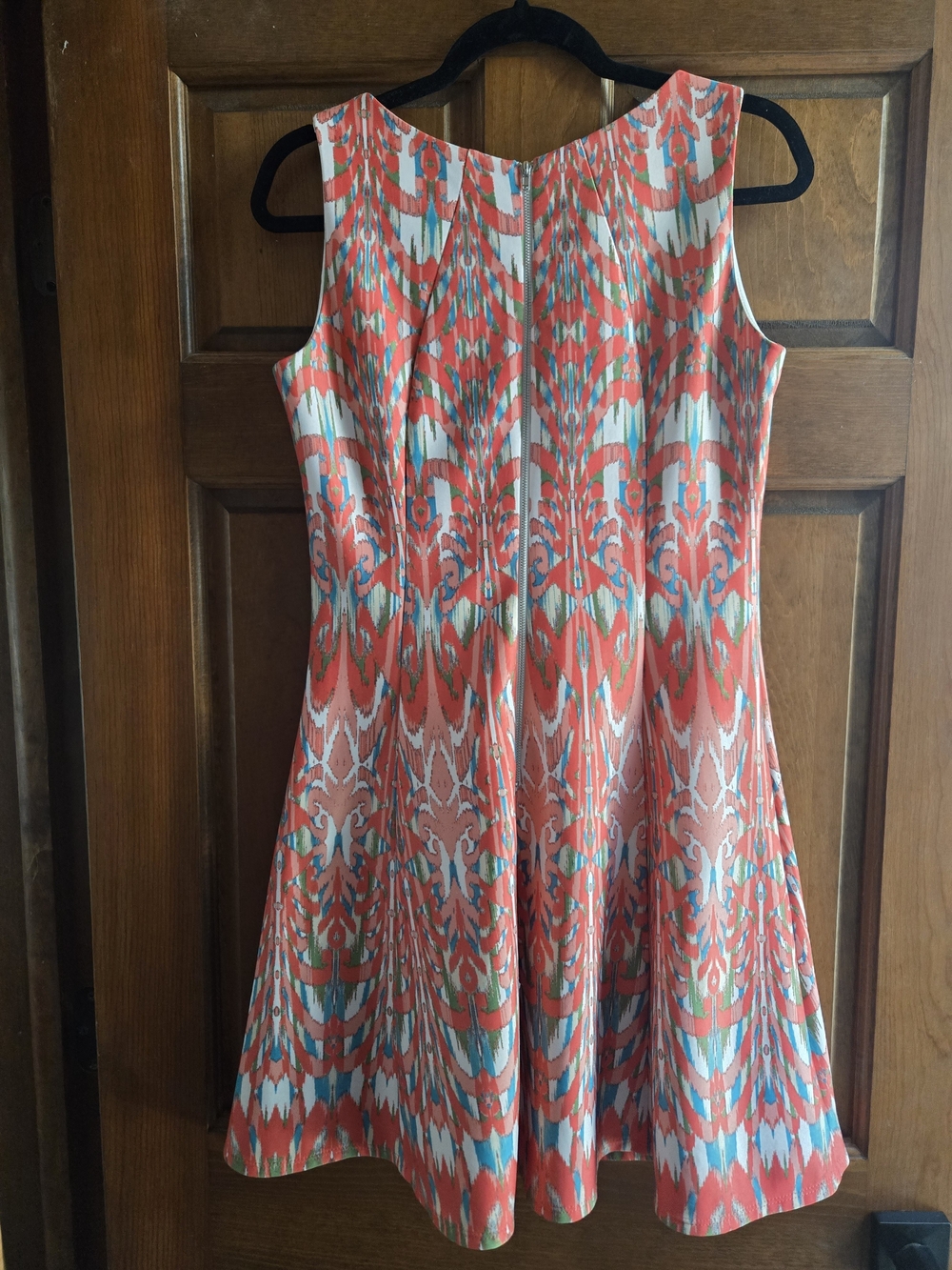 Gabby Skye Coral Ikat Print Sleeveless Mini Dress with Teal Accents